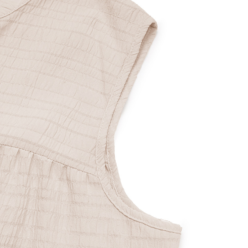 Robe midi bohème sans manches à volants et col à pompons