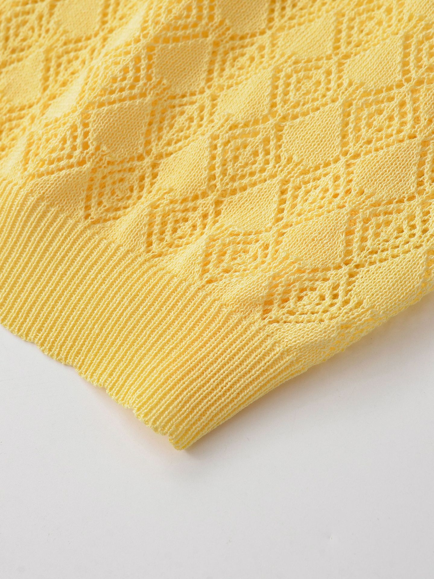 Cardigan polo da donna giallo a maglia aperta, maniche corte
