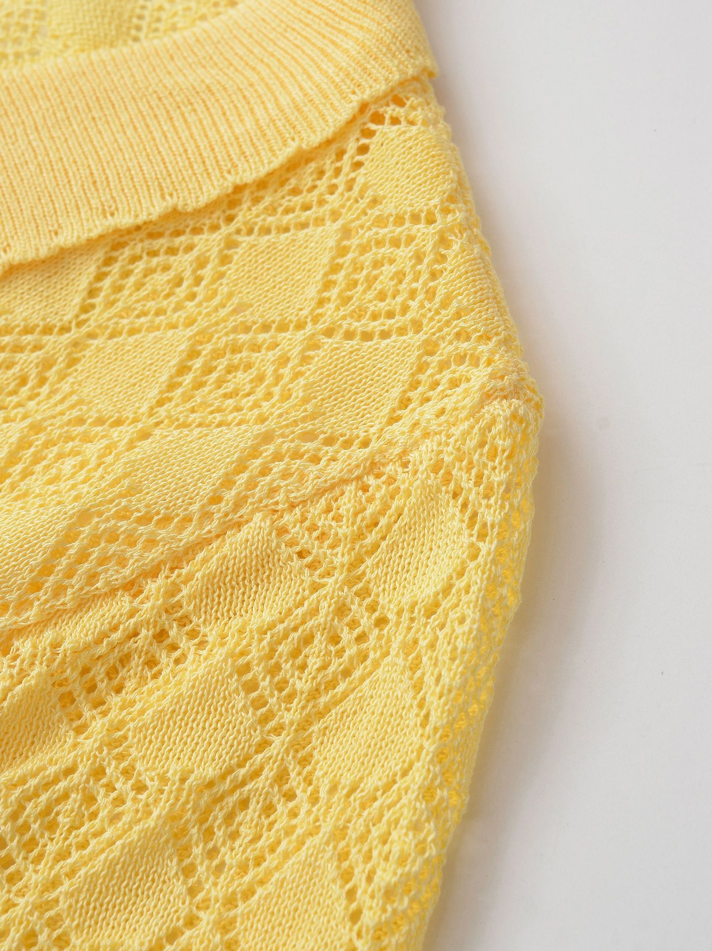 Cardigan polo da donna giallo a maglia aperta, maniche corte