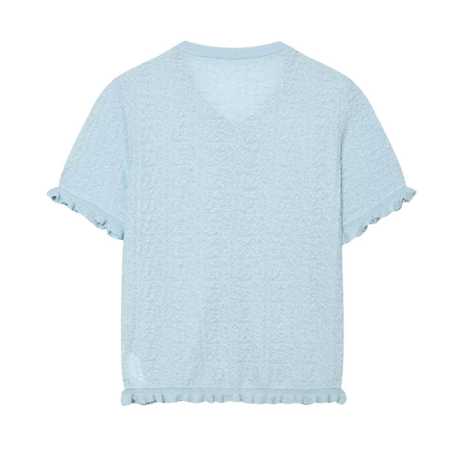 Cardigan chic a maniche corte con texture e volant.