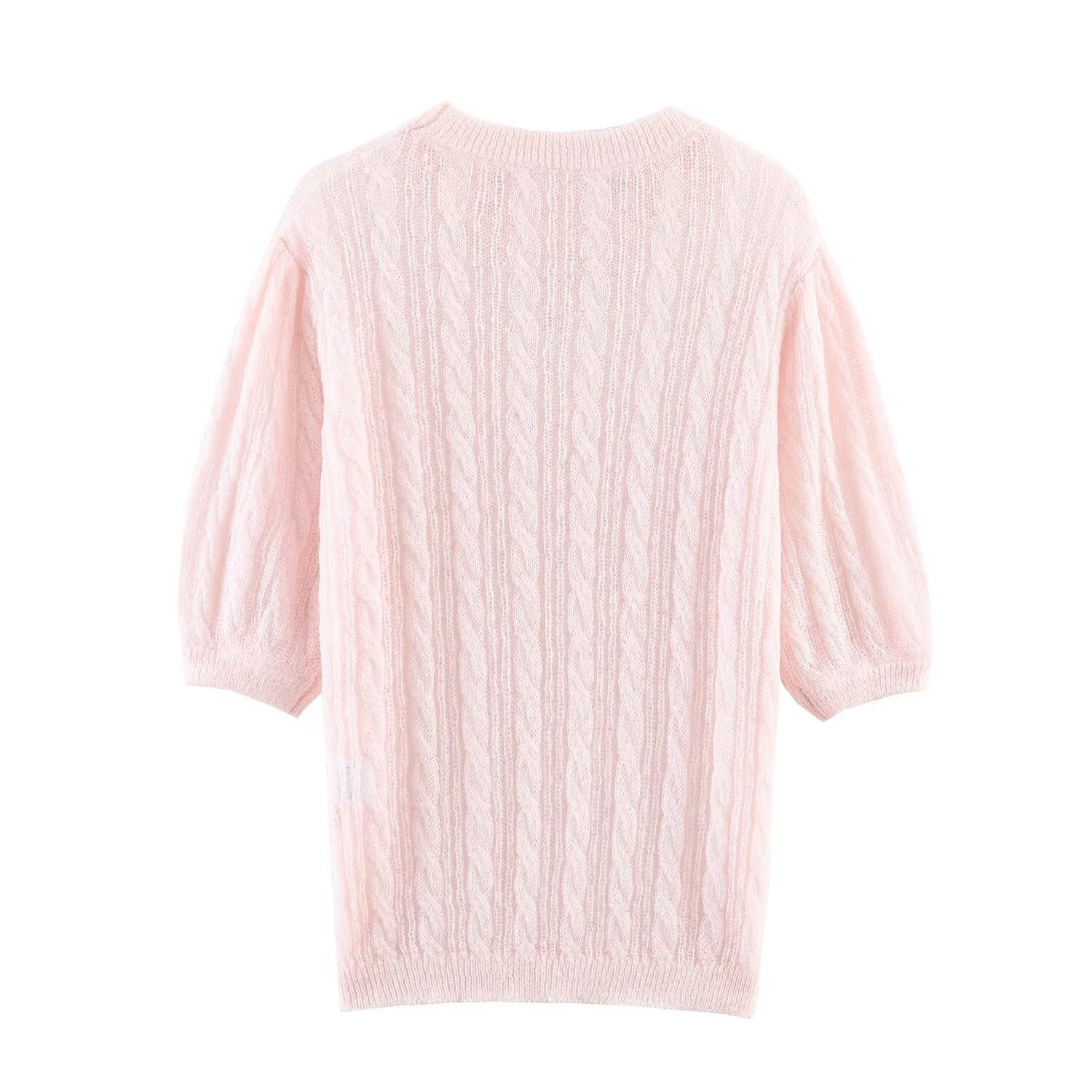 Elegante top rosa chiaro in maglia a trecce con maniche a sbuffo trasparenti.