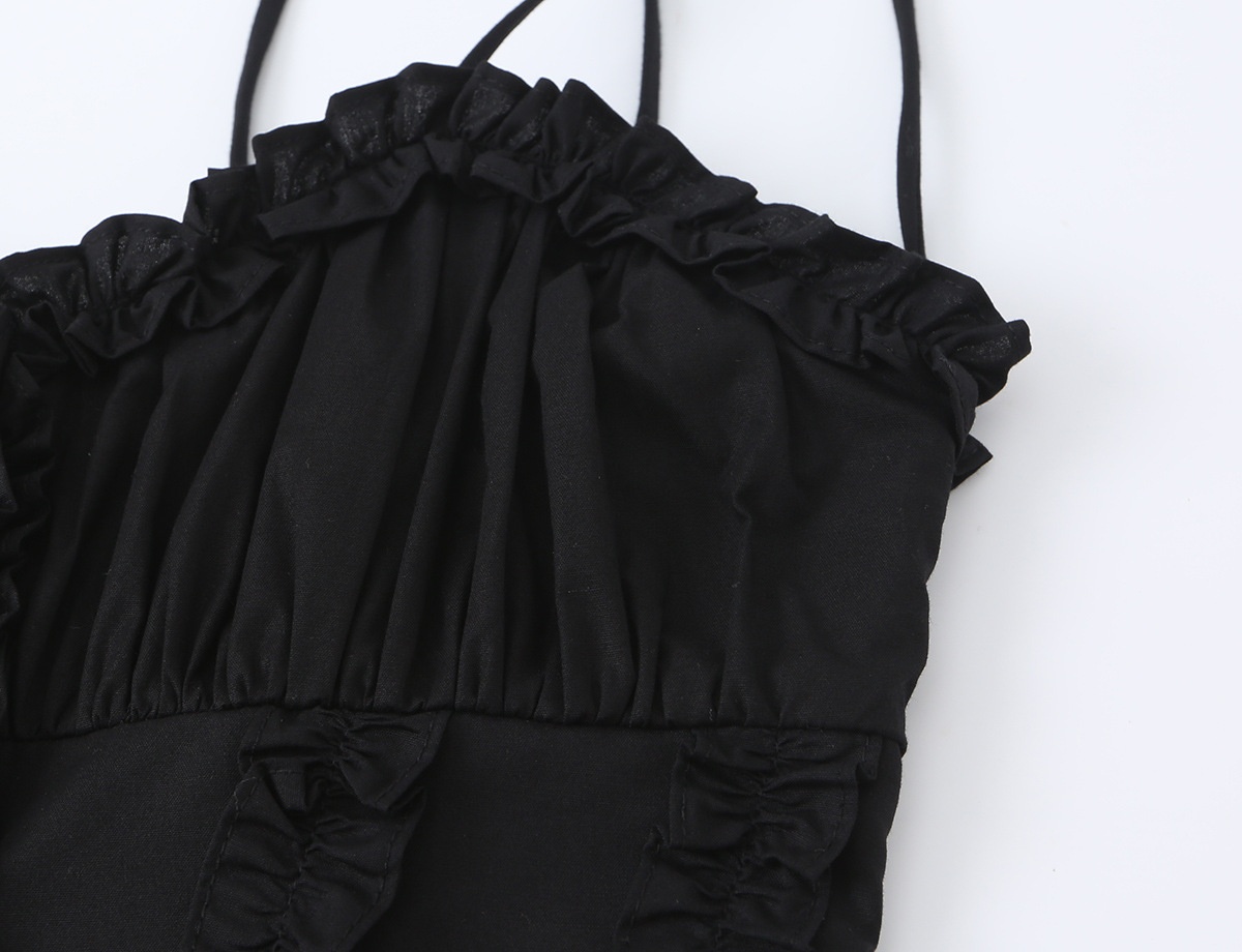 Elegante top a corsetto con volant e spalline da annodare.
