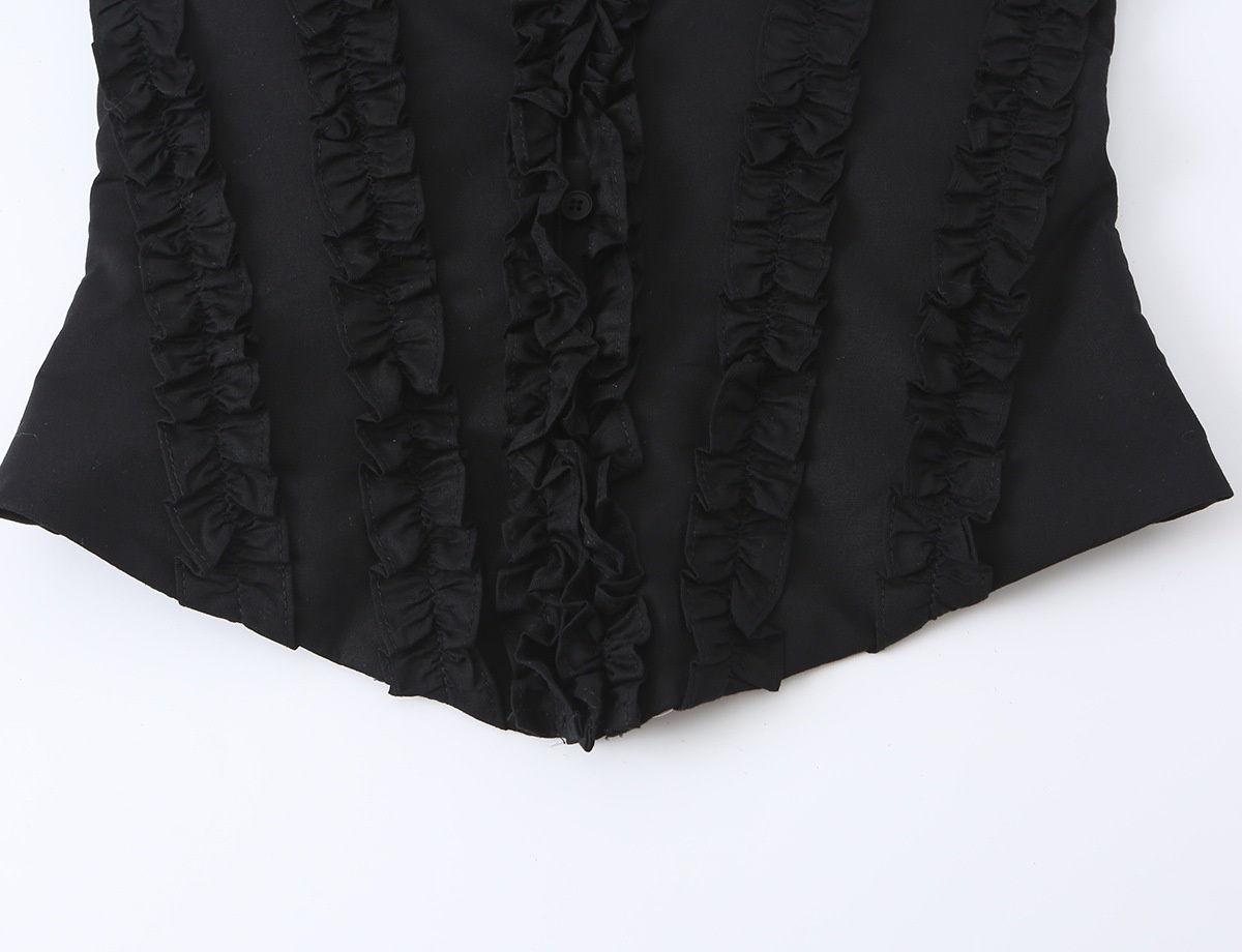 Elegante top a corsetto con volant e spalline da annodare.