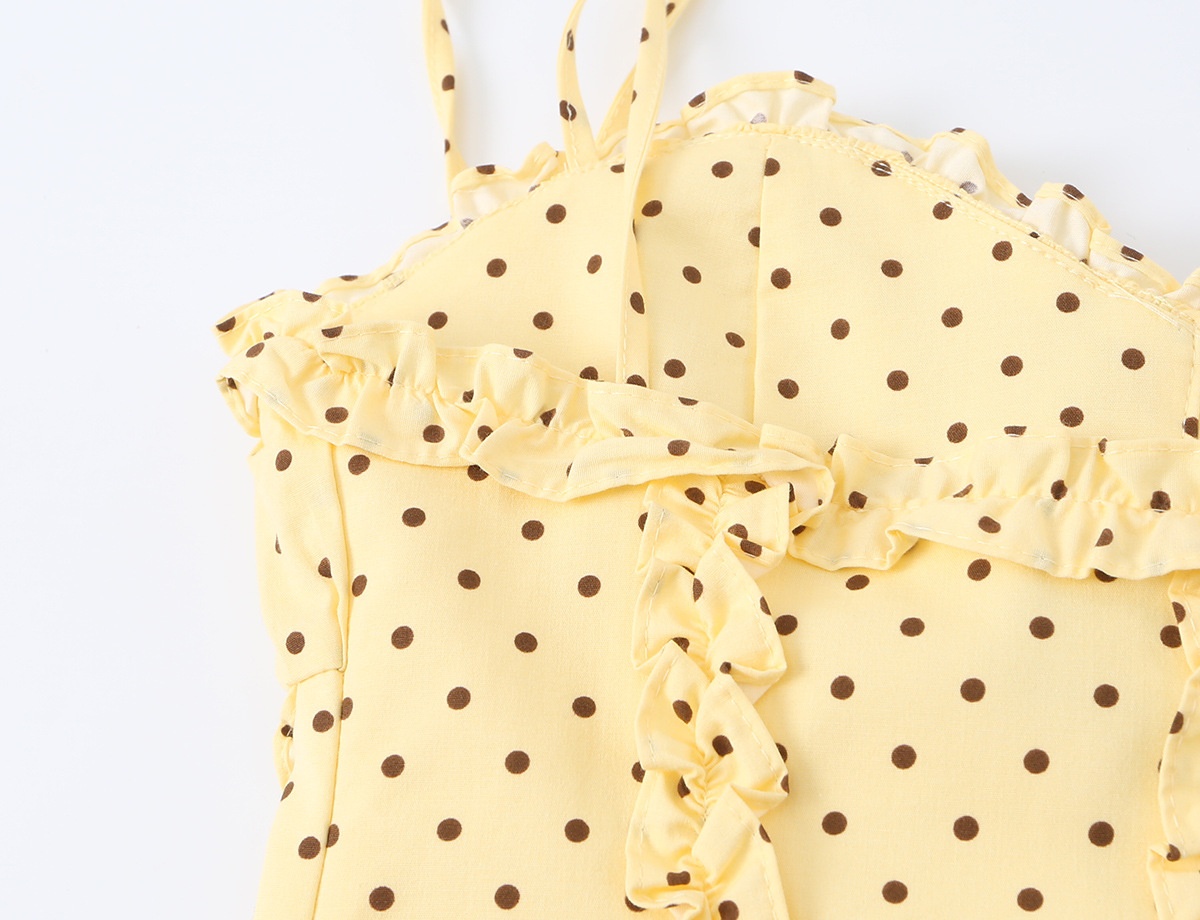 Elegante top a corsetto con volant e spalline da annodare.