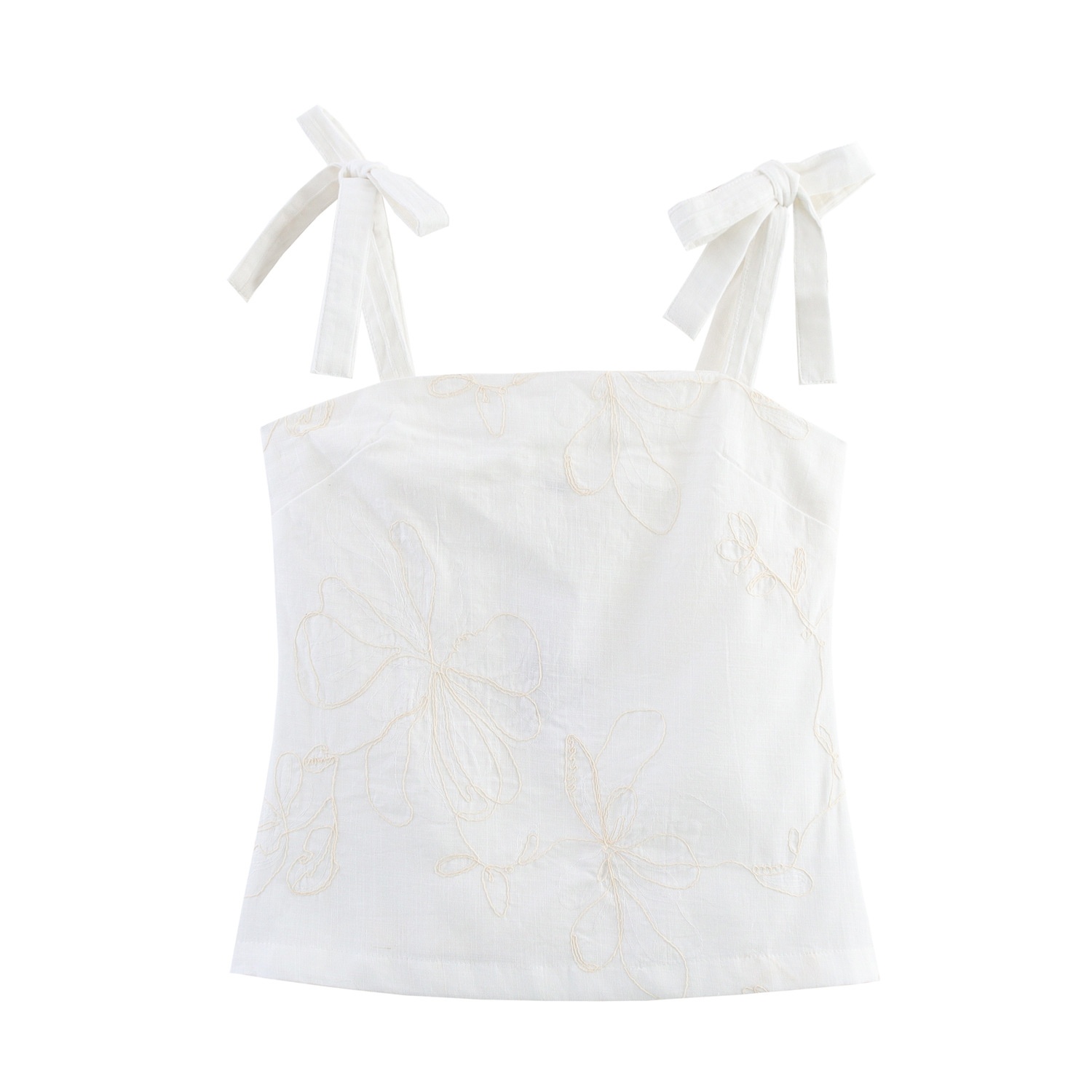 Top a canotta bianco con stampa floreale e laccetti sulle spalle.