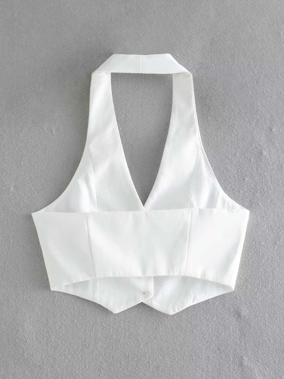 Elegante top corto bianco con scollo all'americana per donna