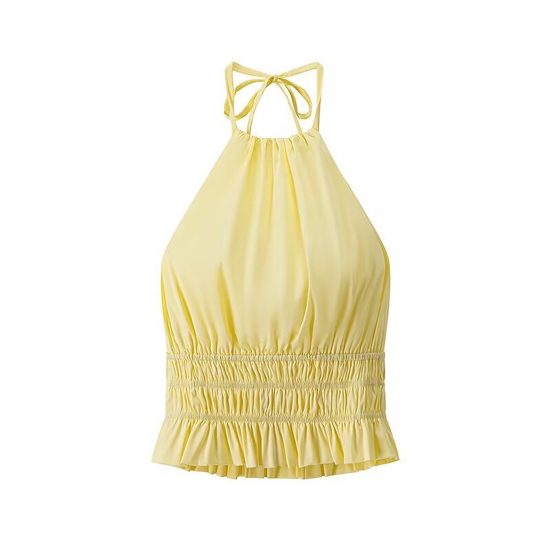 Elegante crop top giallo con scollo all'americana, orlo arricciato e volant.