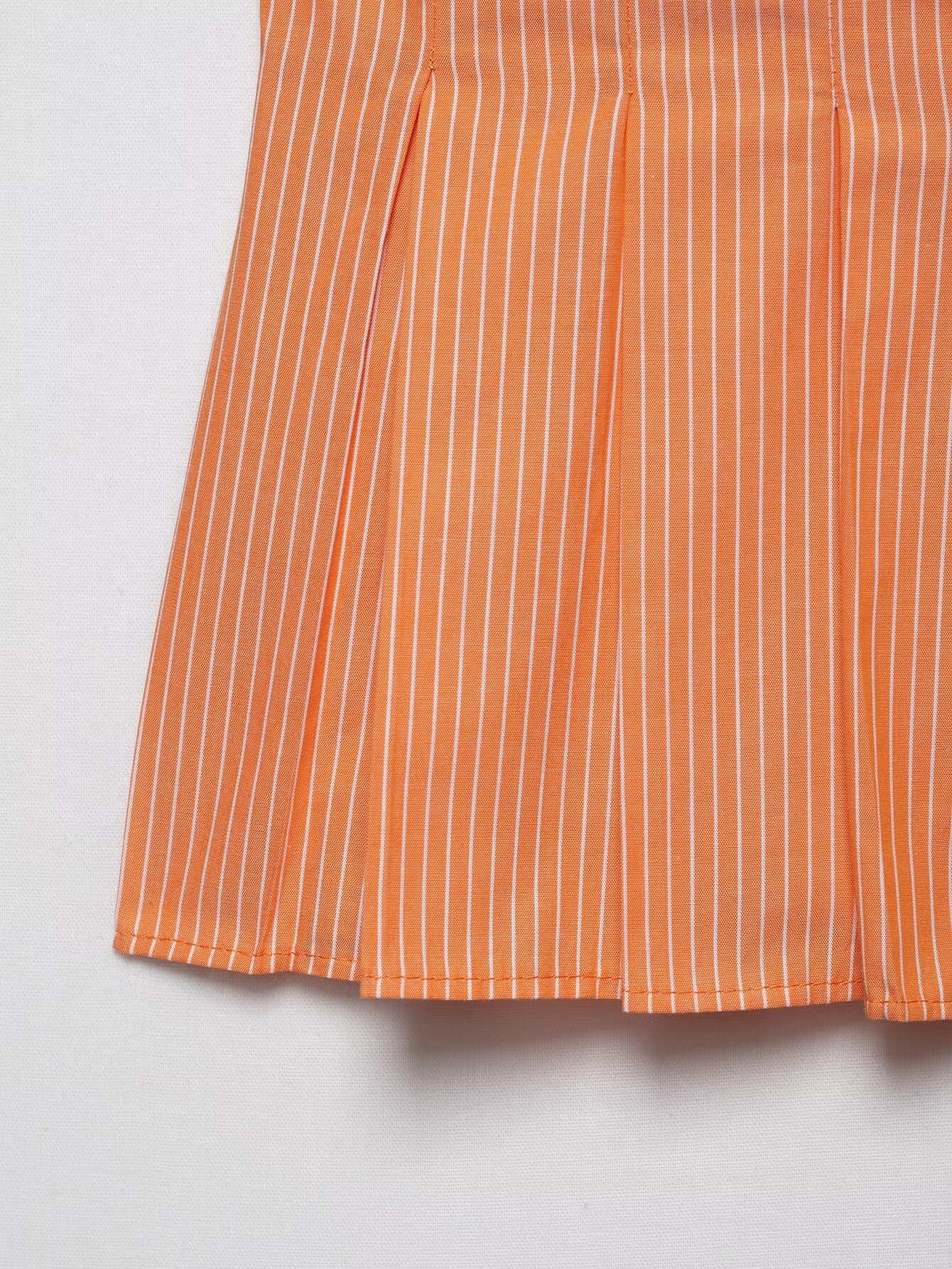 Top a canotta plissettato con scollo a V e righe arancioni