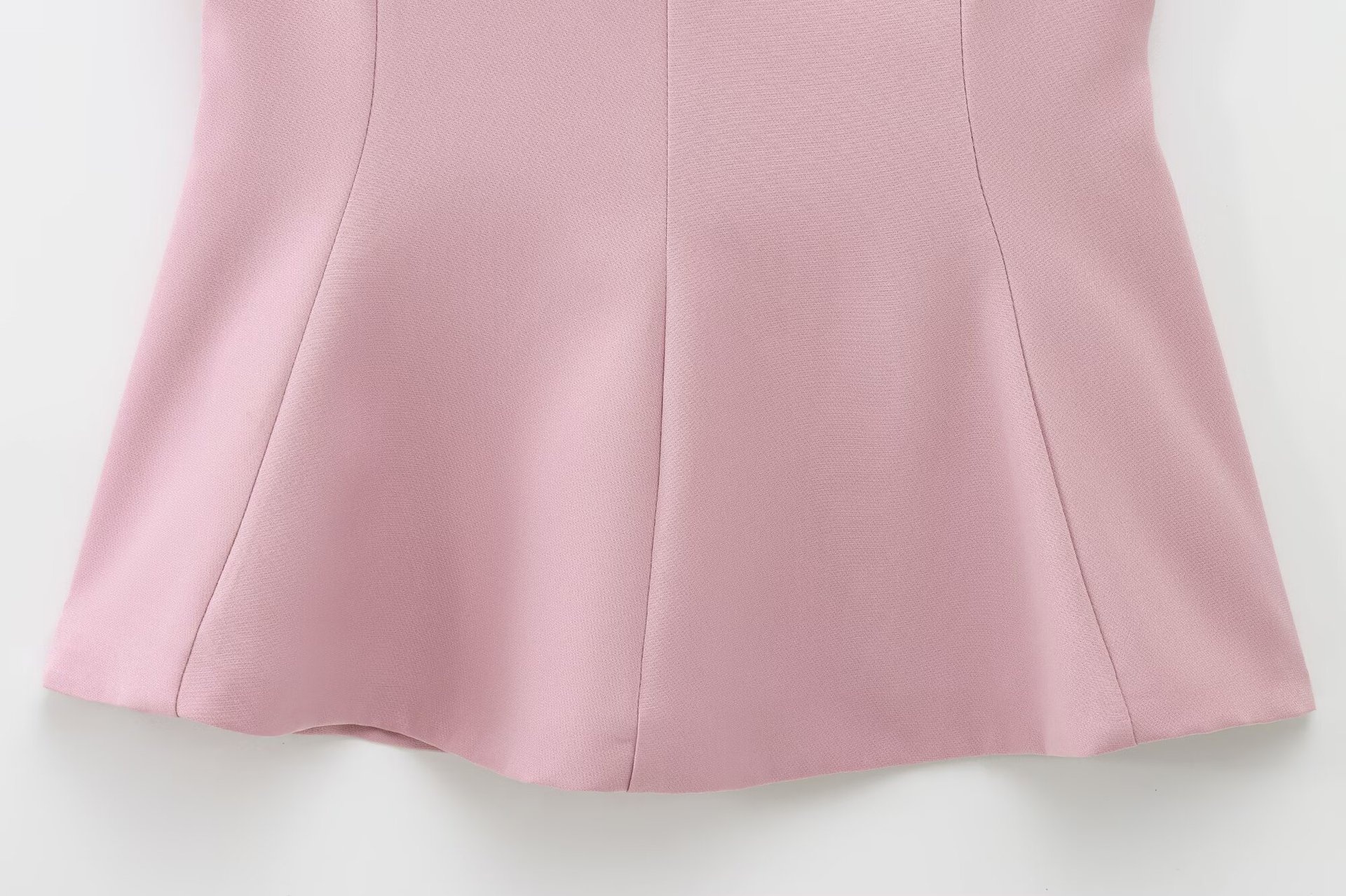 Top peplum da donna senza maniche con fiocco sulla schiena