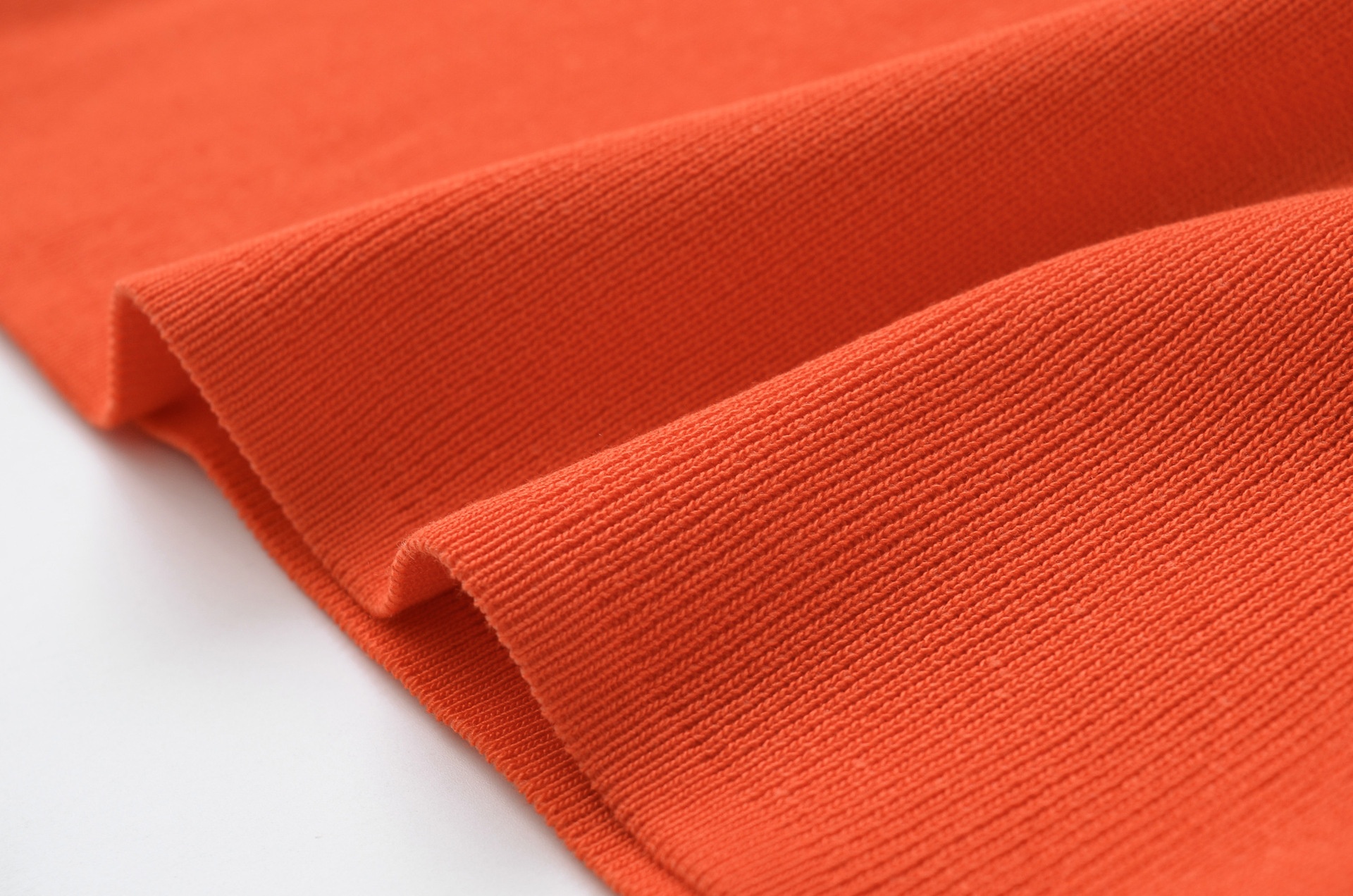 Elegante crop top arancione in maglia con profili a contrasto - Senza maniche