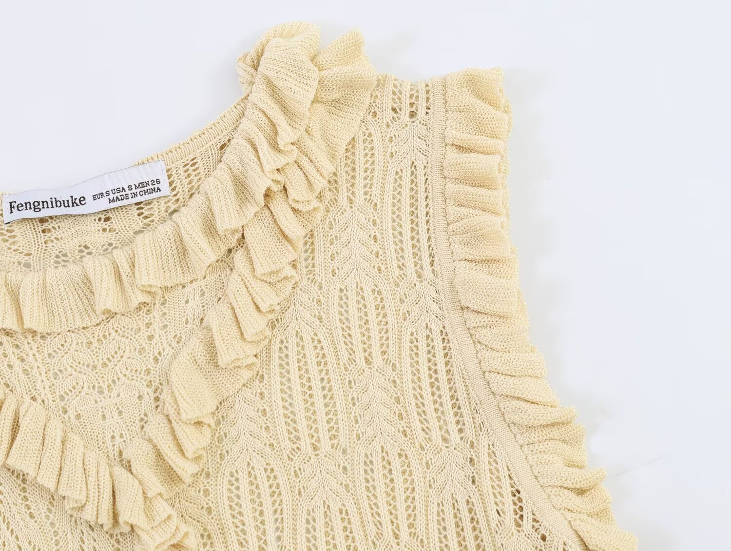 Elegante top senza maniche in maglia con volant - Gilet in maglia beige raffinato