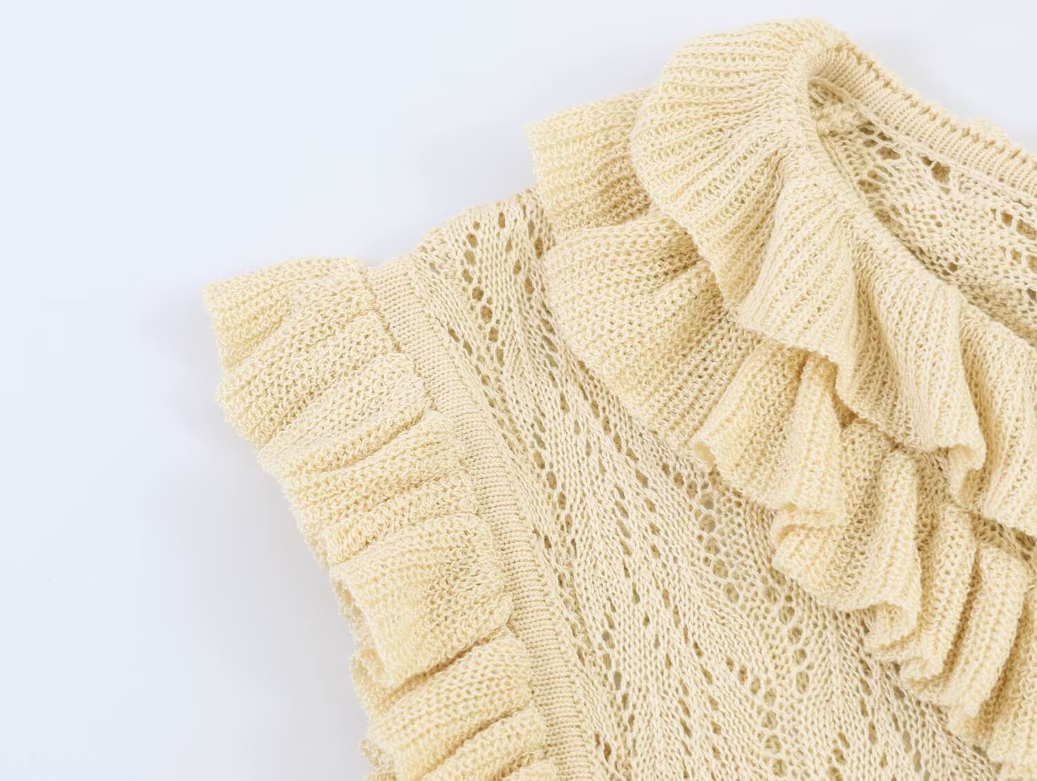 Elegante top senza maniche in maglia con volant - Gilet in maglia beige raffinato