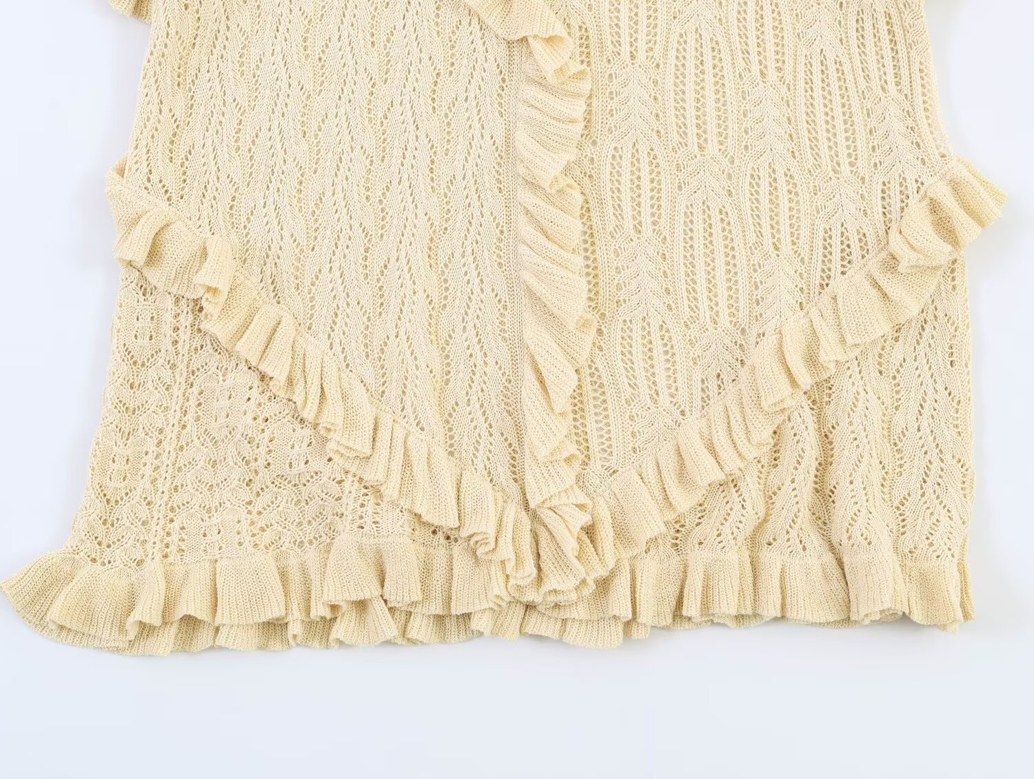 Elegante top senza maniche in maglia con volant - Gilet in maglia beige raffinato