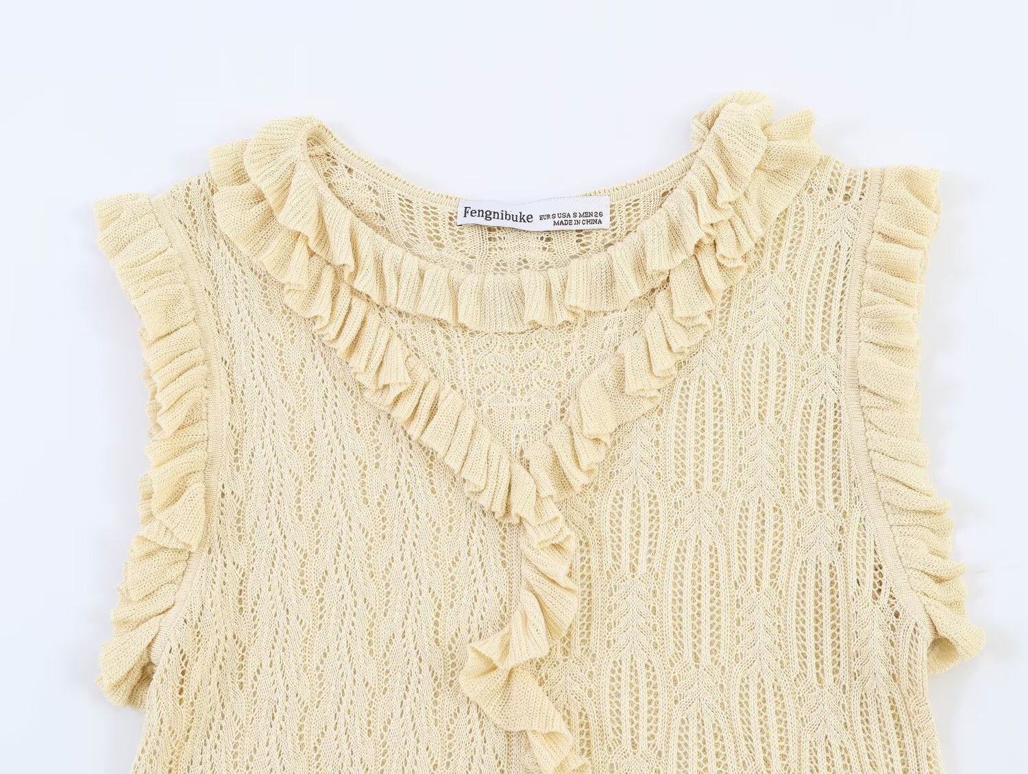 Elegante top senza maniche in maglia con volant - Gilet in maglia beige raffinato