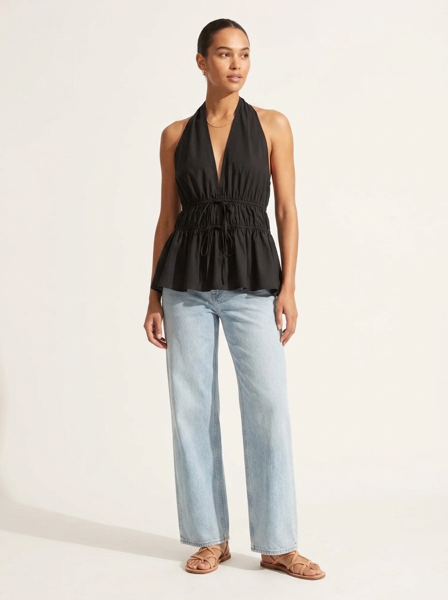 Elegante top peplum con scollo all'americana e coulisse in vita