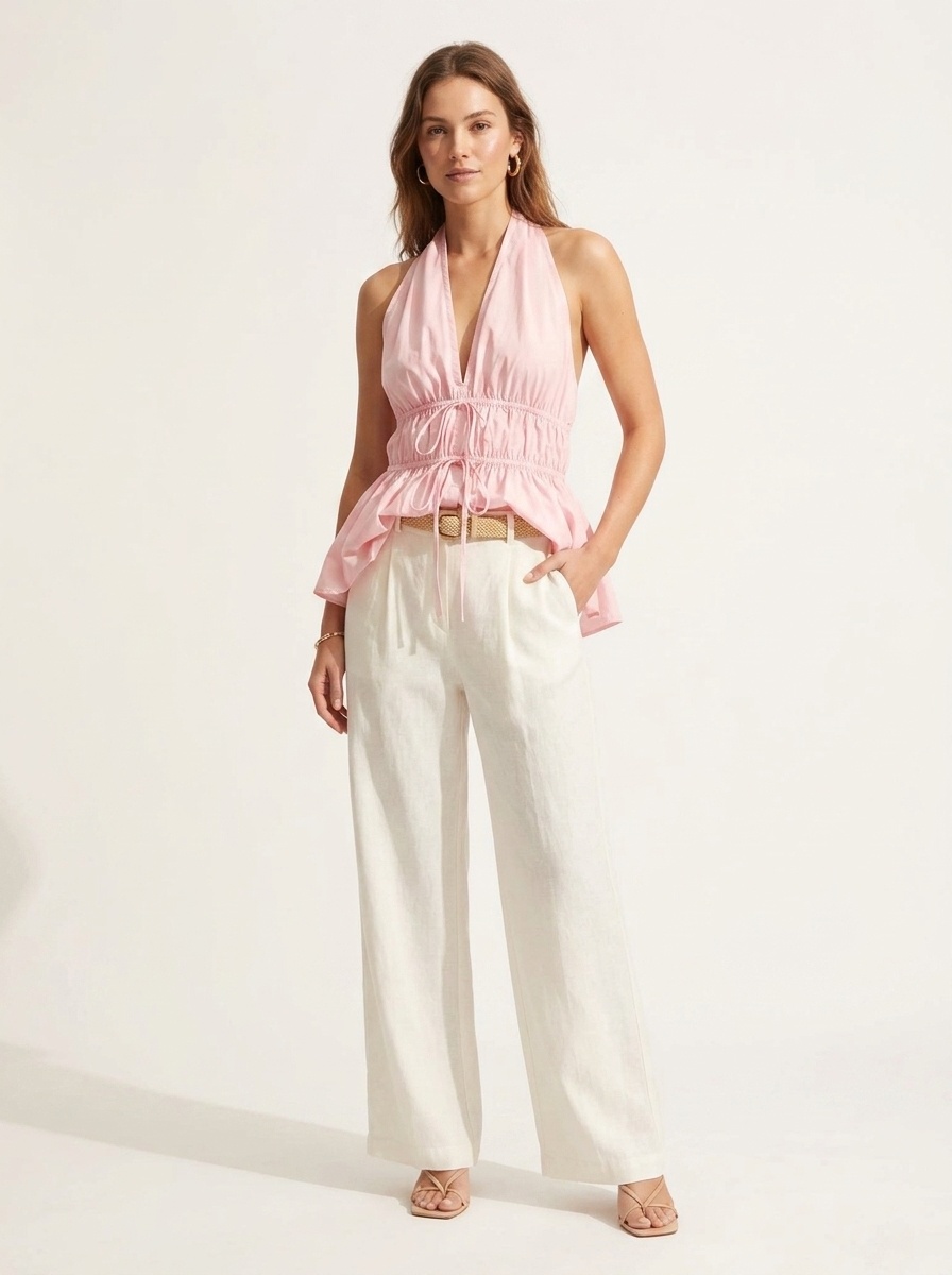 Elegante top peplum con scollo all'americana e coulisse in vita