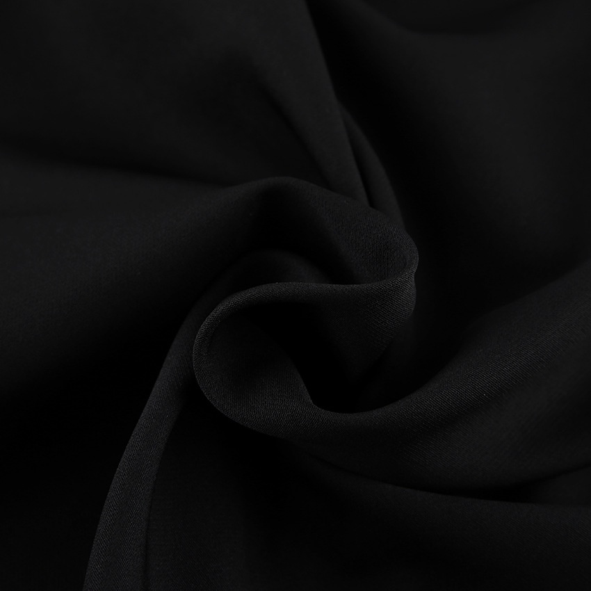 Robe midi moulante élégante à manches bouffantes, découpes et col noué