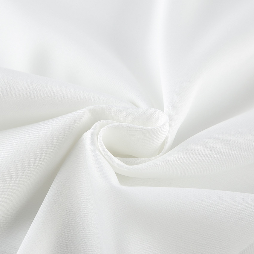 Ensemble élégant haut cache-cœur blanc et jupe maxi