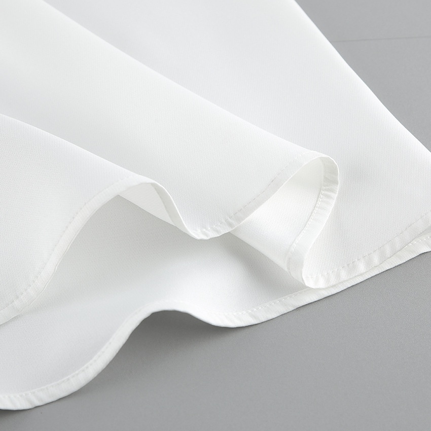 Ensemble élégant haut cache-cœur blanc et jupe maxi