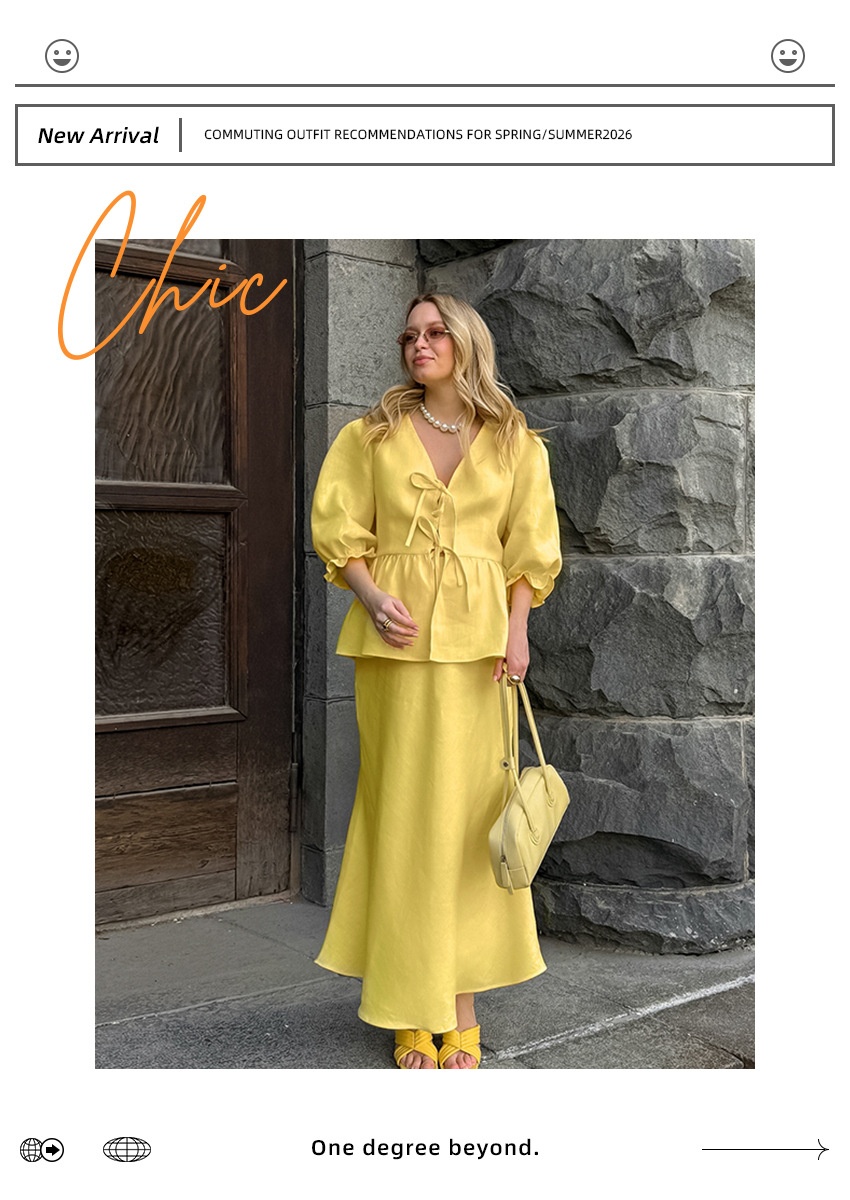 Completo giallo composto da top peplum con maniche a sbuffo e gonna lunga.