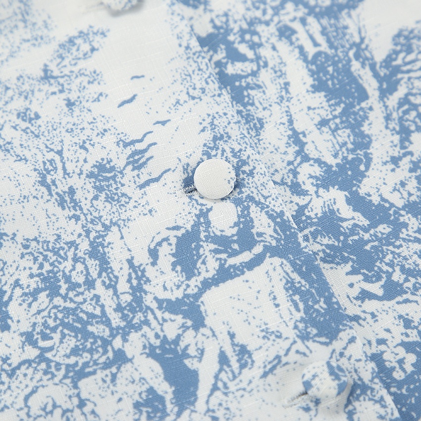 Completo composto da blusa corta e minigonna con stampa toile blu