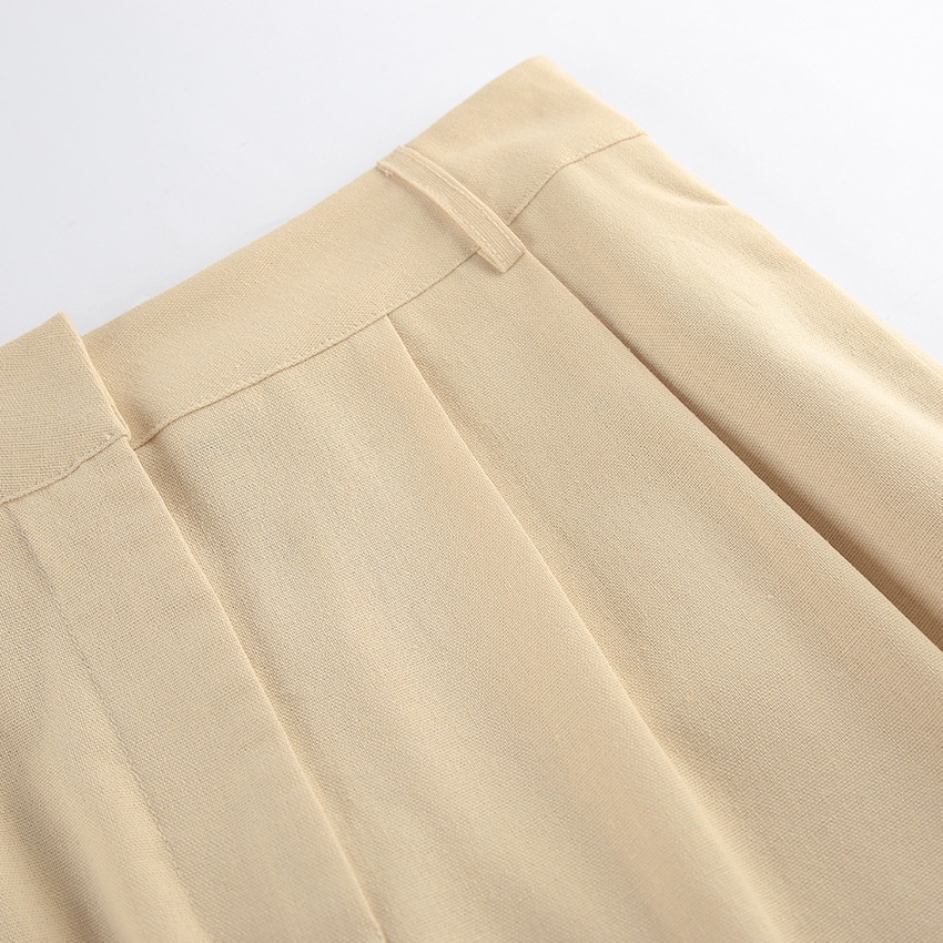 Combinaison beige chic asymétrique à jambes larges