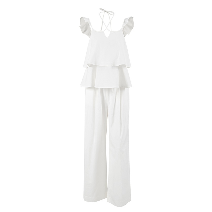 Completo da donna composto da top a canotta bianco con volant e pantaloni a gamba larga.