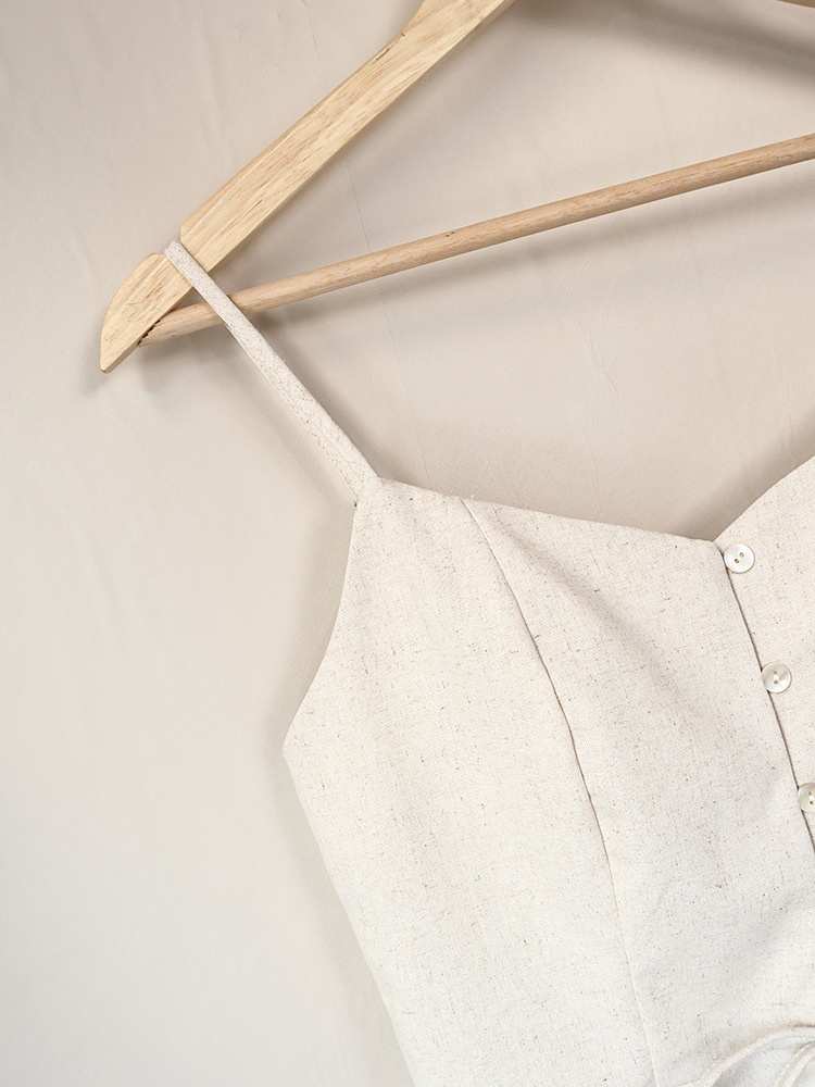 Completo da donna composto da top peplum senza maniche e pantaloni a gamba larga.