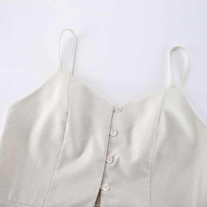 Completo da donna composto da top peplum senza maniche e pantaloni a gamba larga.