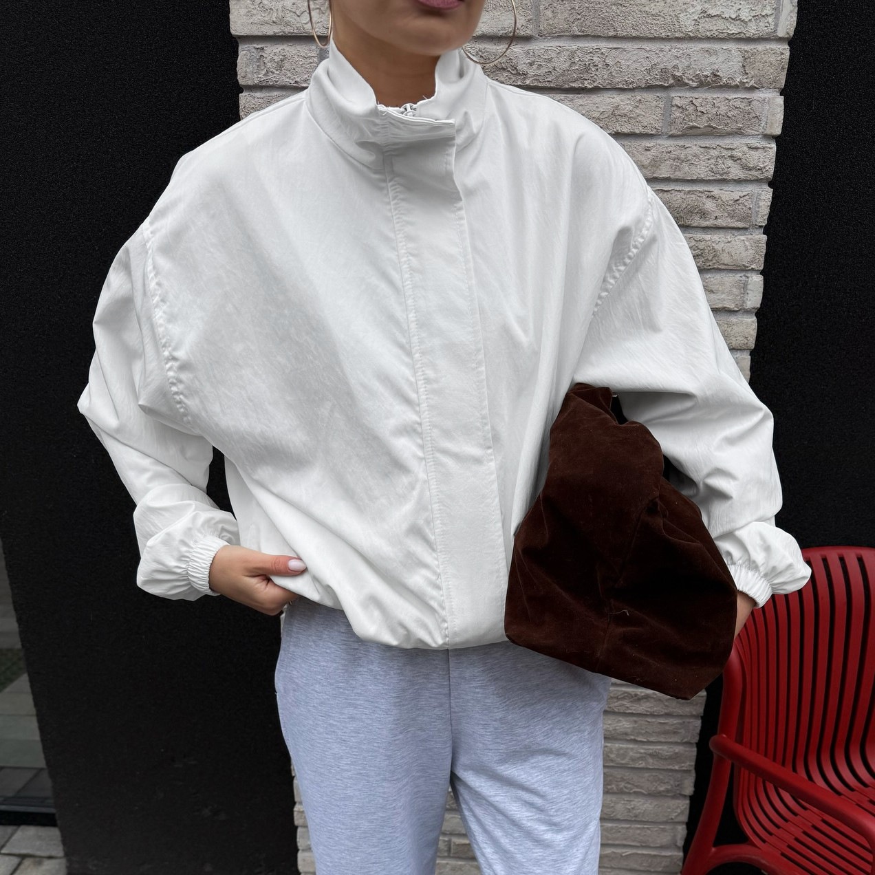 Giacca bomber da donna con collo alto e cerniera