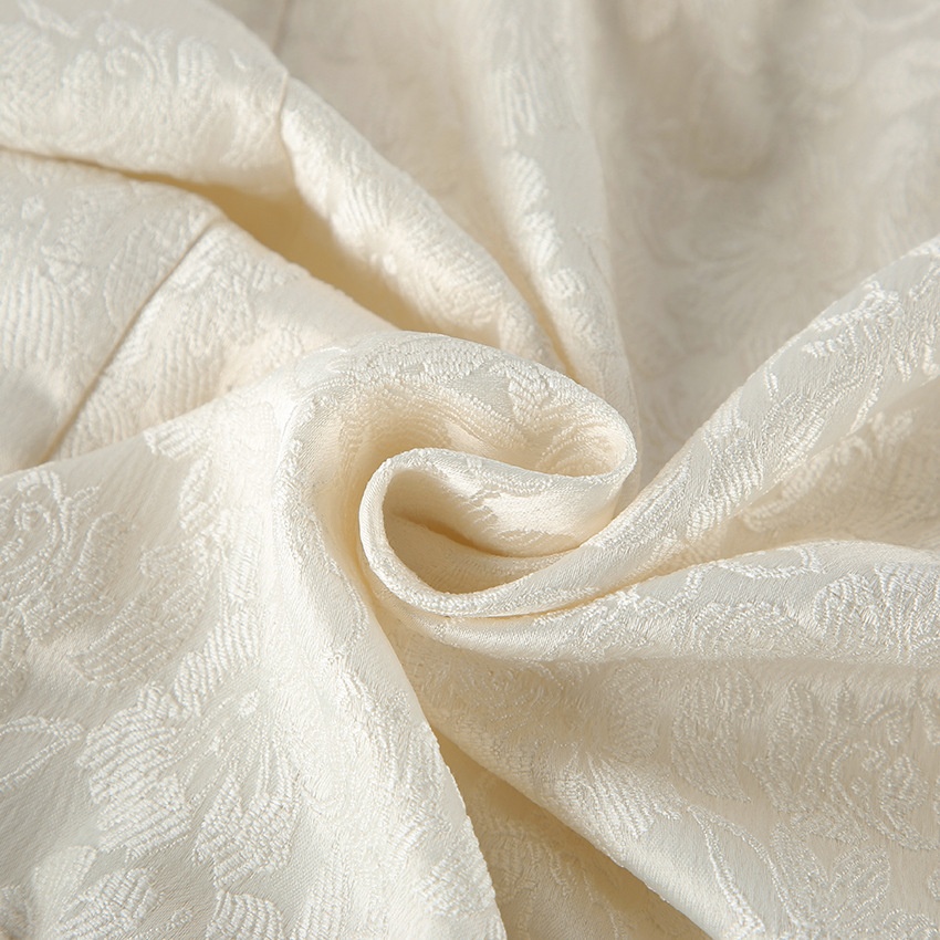 Giacca con zip e coulisse in jacquard floreale