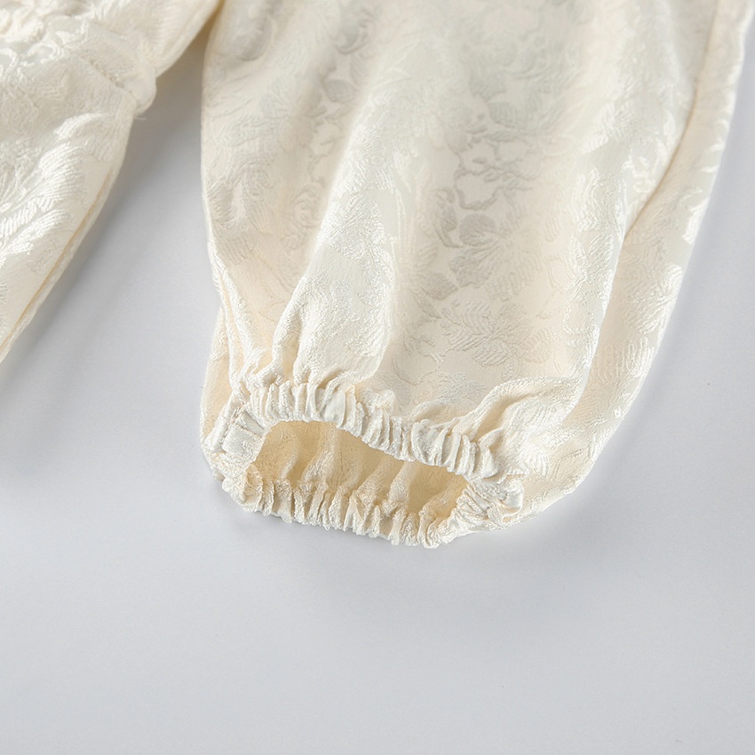 Giacca con zip e coulisse in jacquard floreale