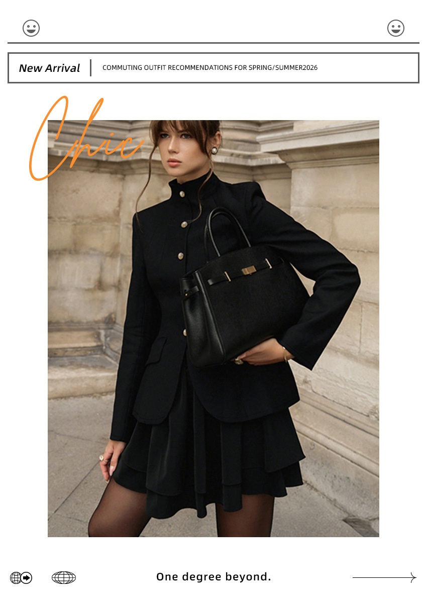 Completo da donna nero composto da blazer con collo alto e gonna a balze.