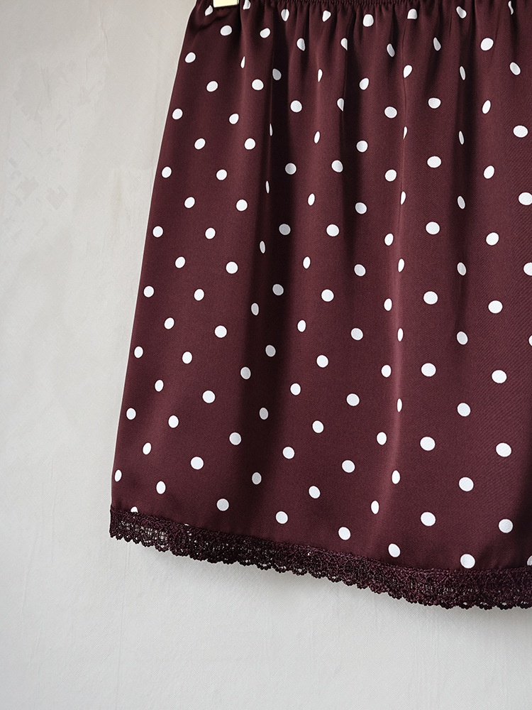 Minigonna da donna a pois con orlo in pizzo