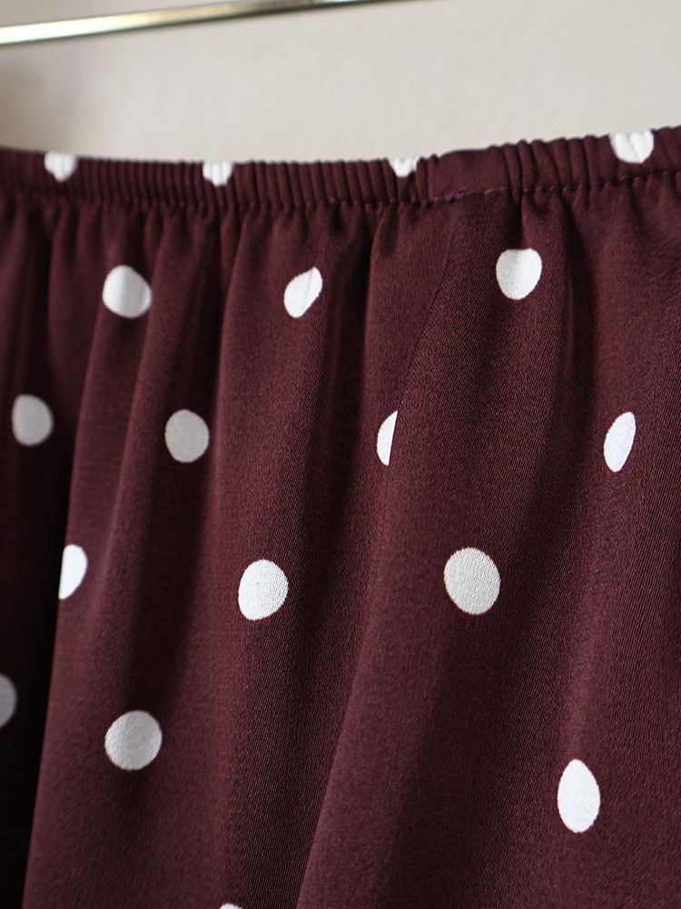 Minigonna da donna a pois con orlo in pizzo