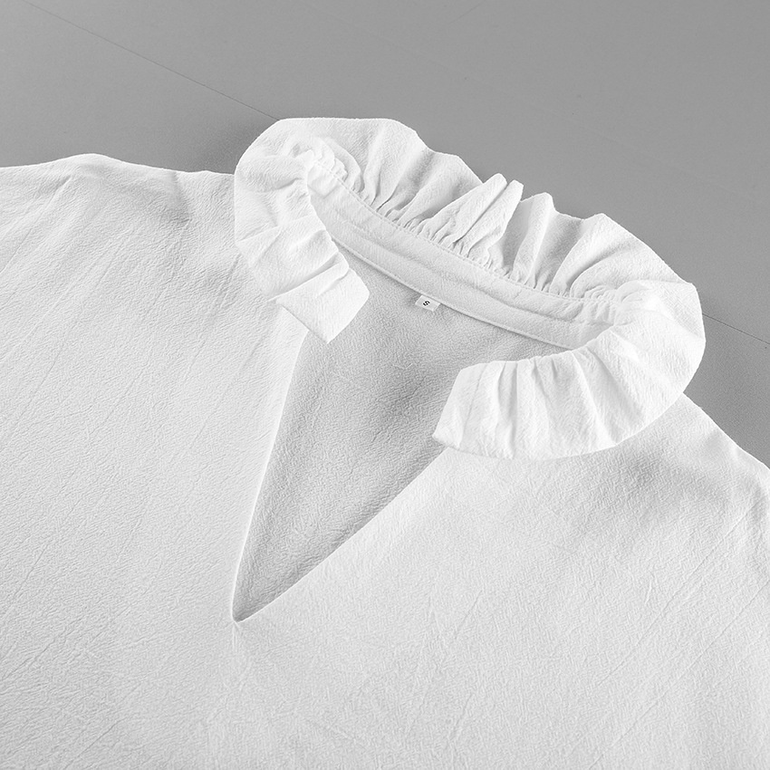 Chemisier blanc à volants, col en V et manches bouffantes pour femme