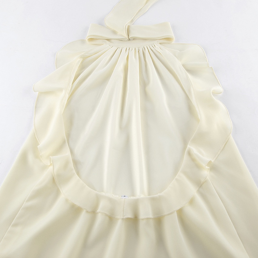 Chemisier élégant blanc cassé à volants et col halter