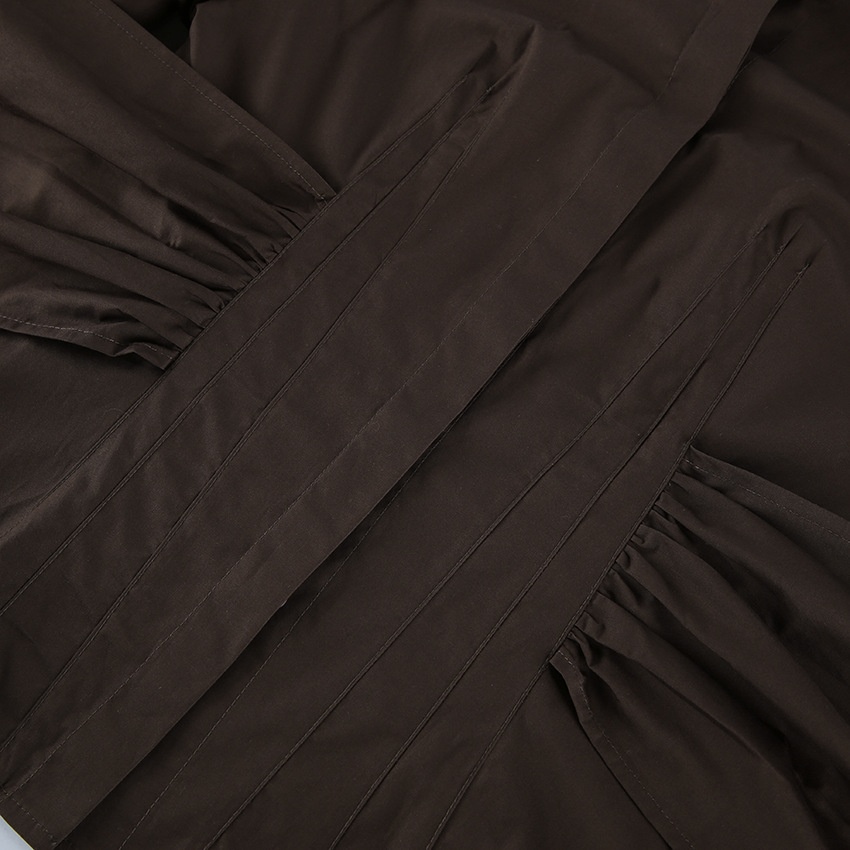 Camicetta da donna a maniche lunghe con pieghe e vita a corsetto