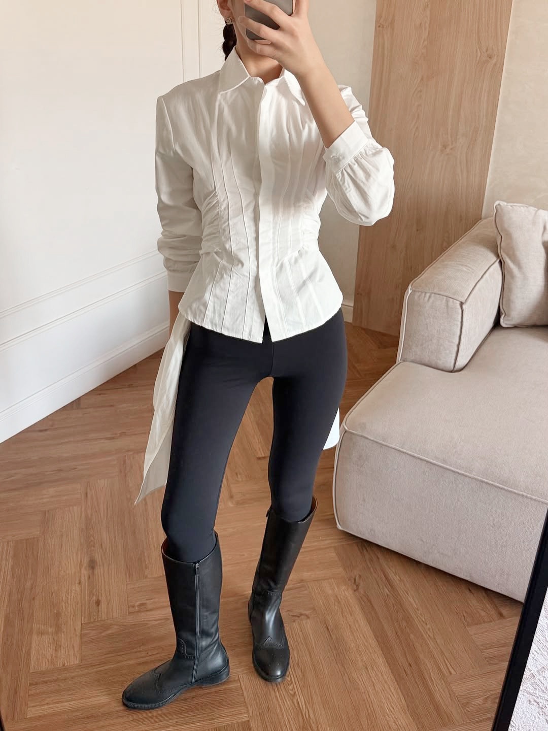 Camicetta da donna a maniche lunghe con pieghe e vita a corsetto