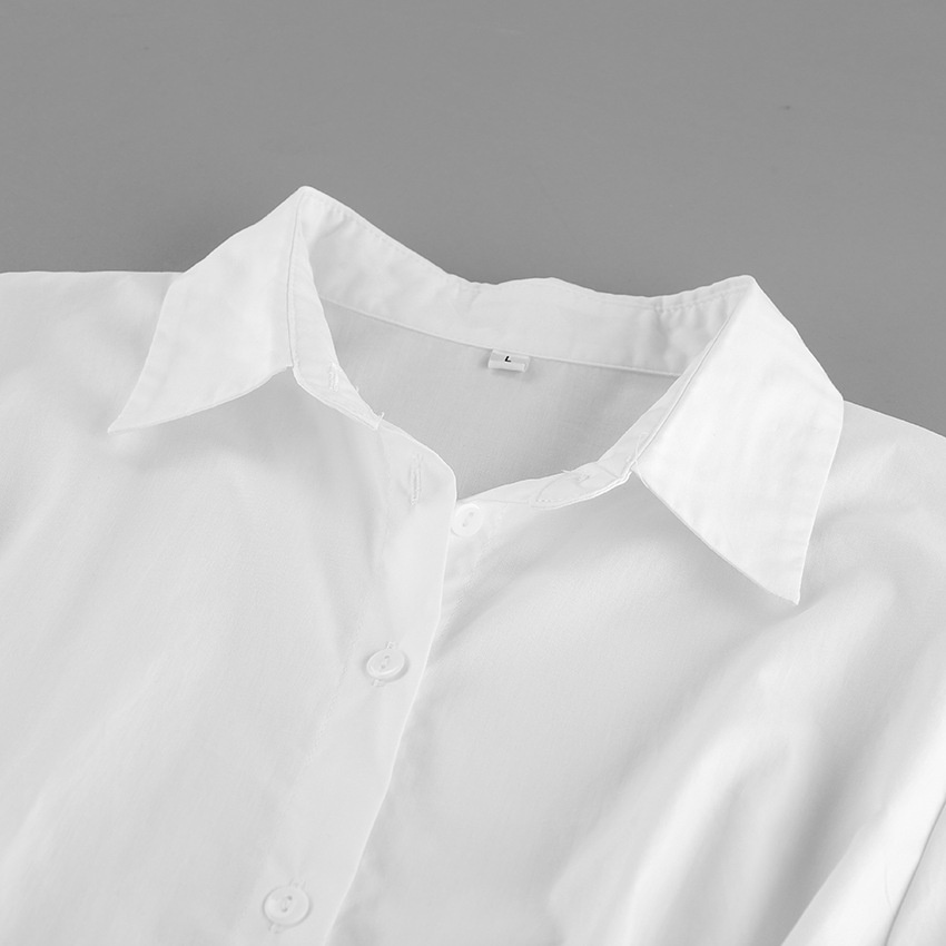 Camicia a maniche lunghe con vita plissettata e chiusura a bottoni