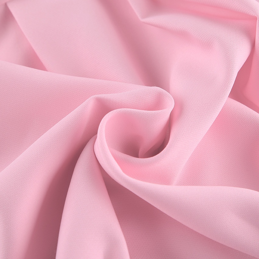 Débardeur rose à basque drapée - Modèle à nouer dans le dos