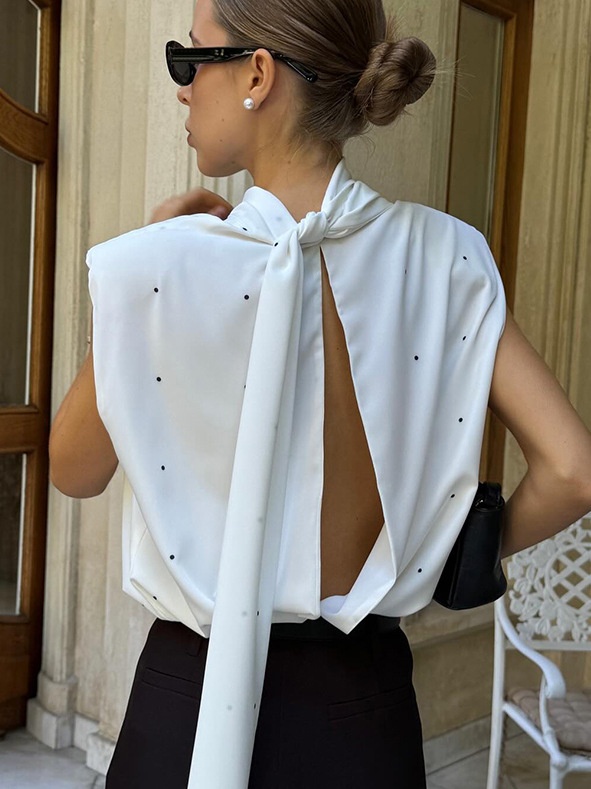 Chemisier sans manches à pois et col montant avec lien dans le dos