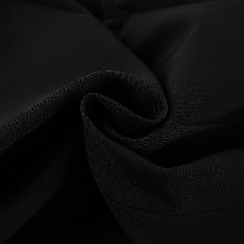 Débardeur péplum sans manches à col montant