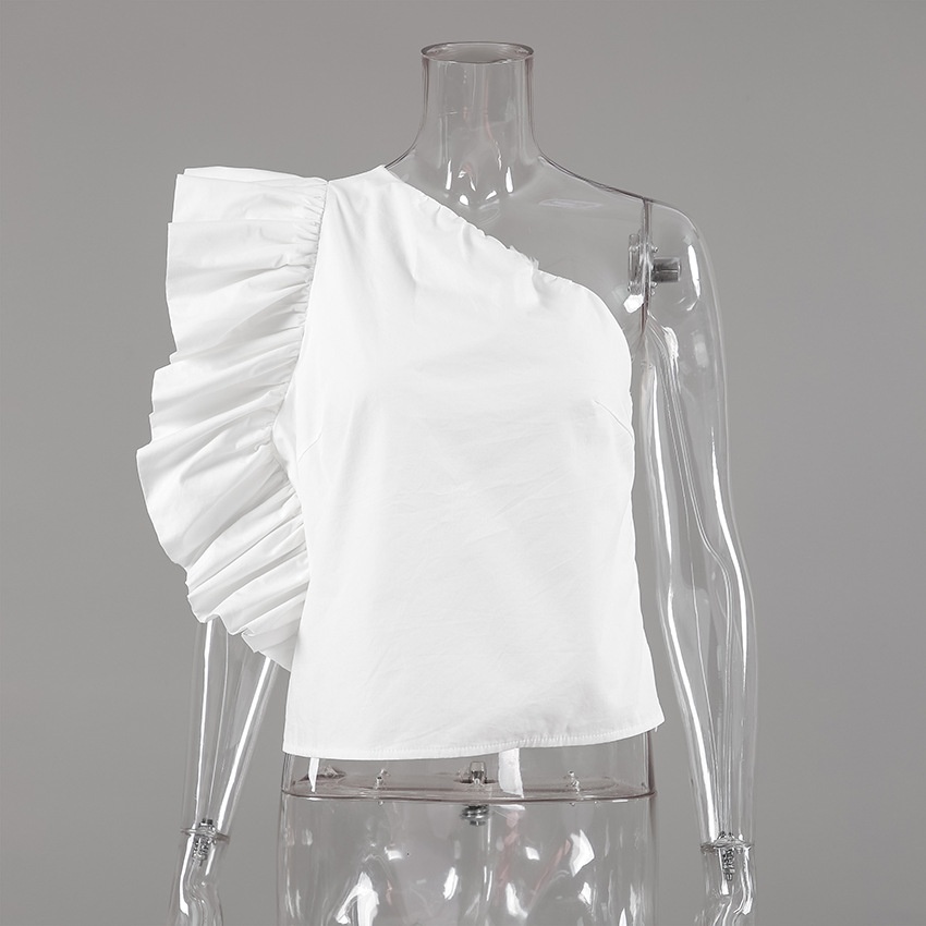 Haut chic blanc à une épaule et à volants