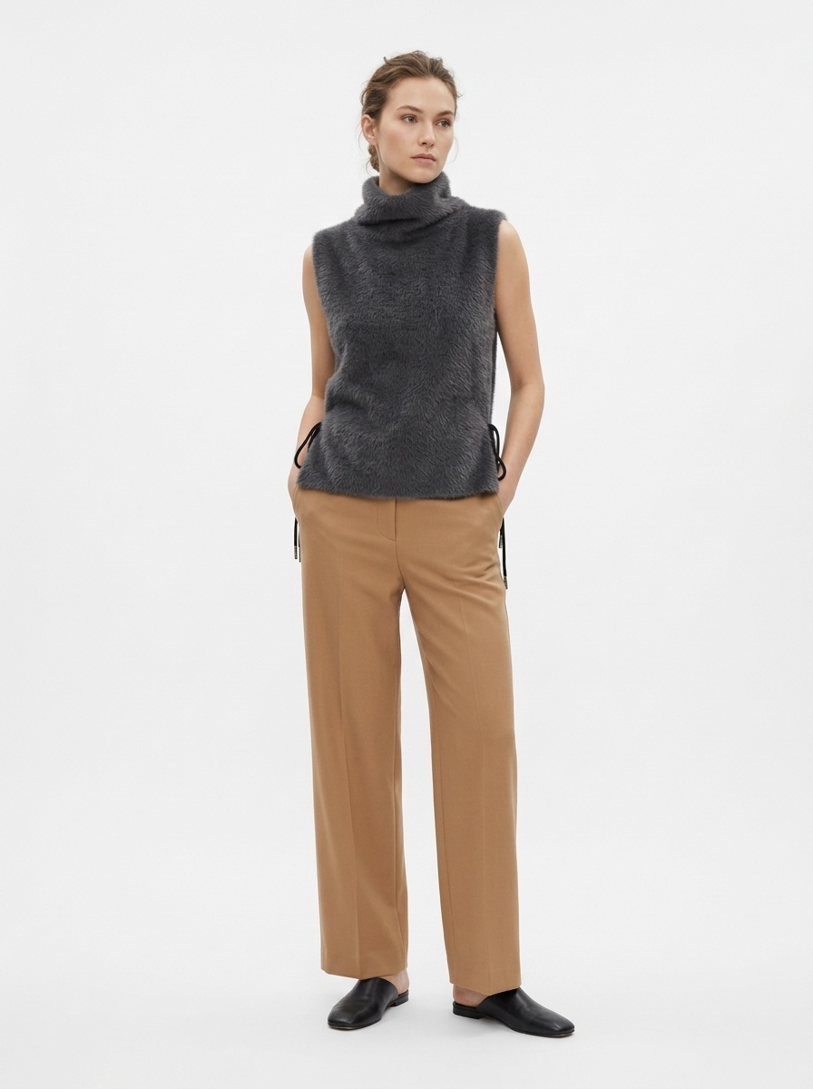 Gilet a collo alto in pelliccia sintetica con lacci laterali