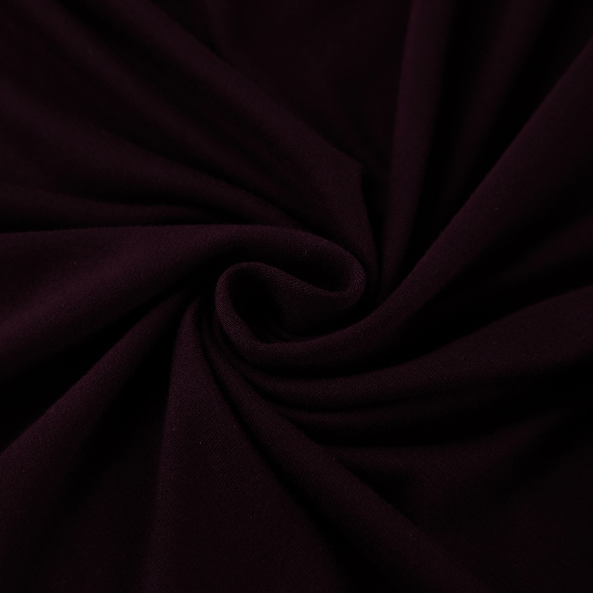 Haut à épaules dénudées, manches longues et taille nouée