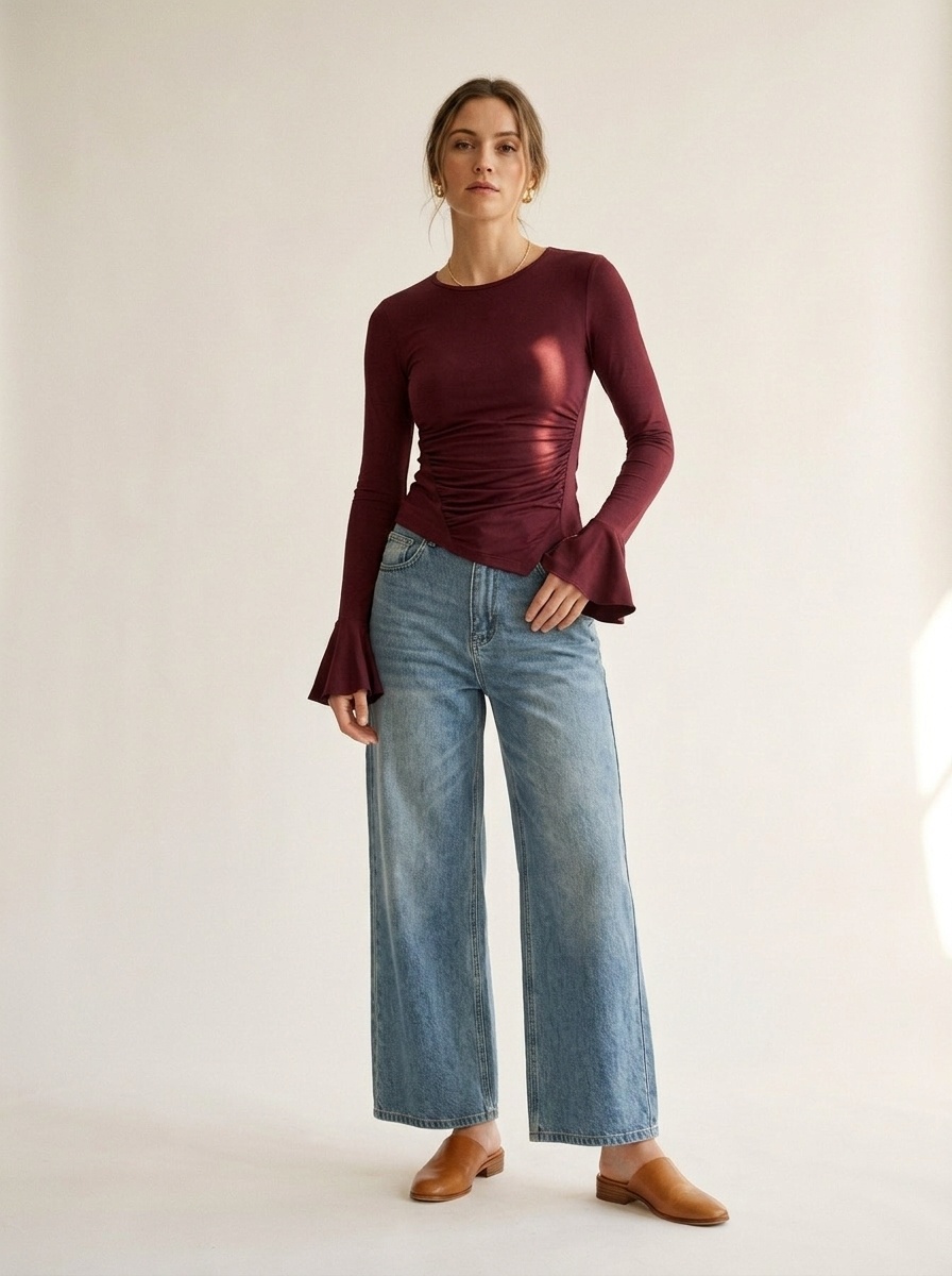 Haut asymétrique à manches longues froncées et poignets évasés