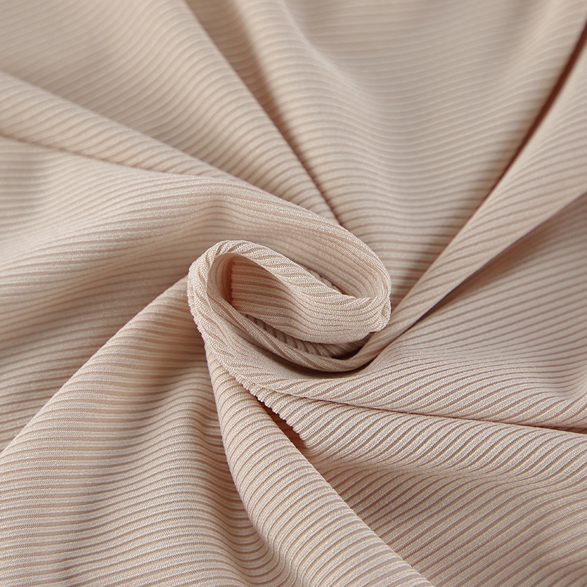 Crop top beige côtelé à fronces et manches cloche