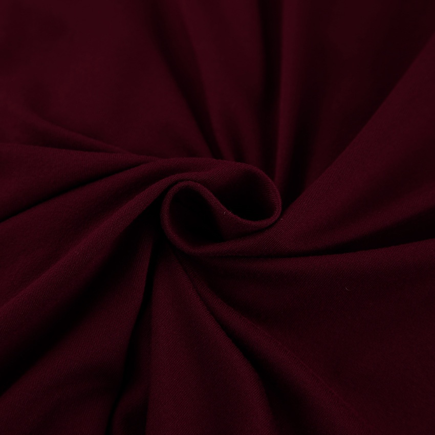 Haut élégant à col drapé, épaules rembourrées et manches longues