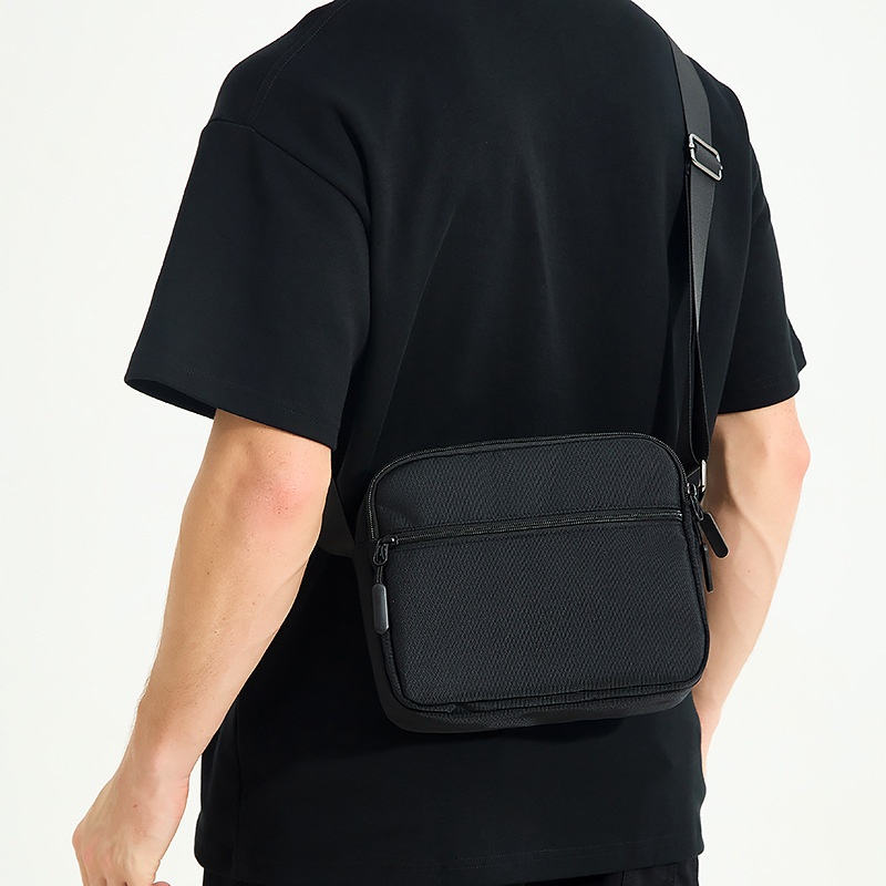Sleek Black Crossbody Bag - Durable & Multi-Pocket
